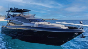Fishing in Cabo San Lucas Mexico – Luxurious Yacht Charter Sleek black yacht cruising the waters, highlighting fishing in Cabo San Lucas Mexico