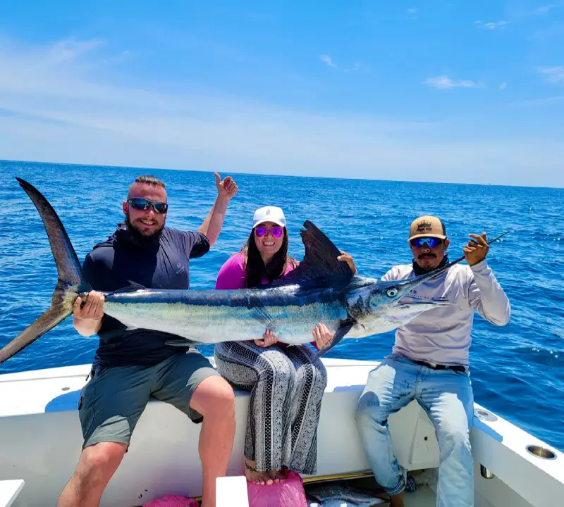 Angler catching a large Marlin on a Cabo fishing charter in Cabo San Lucas